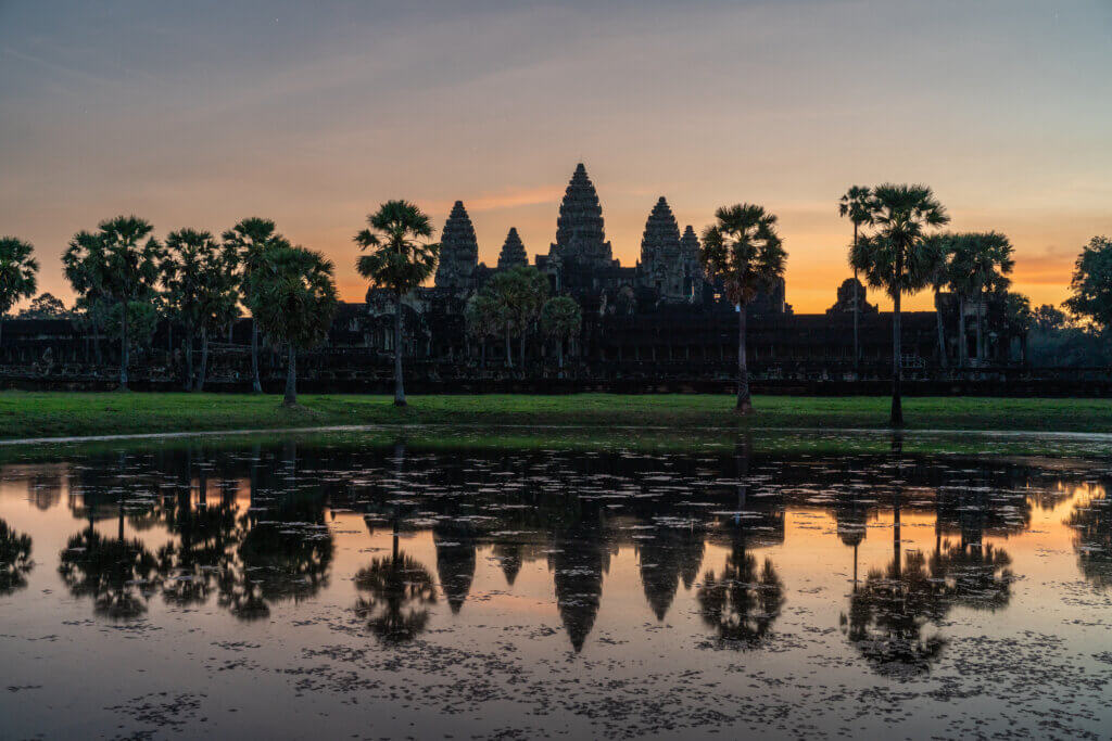 Angkor Wat reflecting in the pond at sunrise