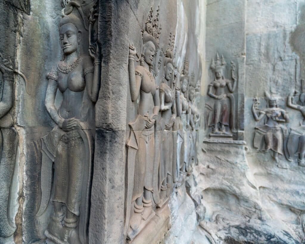Chiseled art on the walls of Angkor Wat